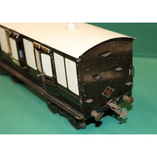 224 - A rare Bing Gauge 3 L&NWR bogie Guards Van. 43cm, buffer to buffer, in lined dark brown and white li... 