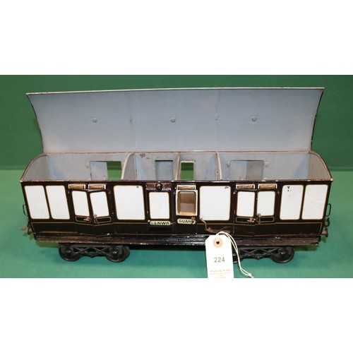 224 - A rare Bing Gauge 3 L&NWR bogie Guards Van. 43cm, buffer to buffer, in lined dark brown and white li... 