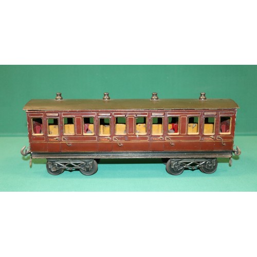 226 - A rare Bing Gauge 3 4 compartment 3rd class bogie passenger coach. 43cm, buffer to buffer. In lined ... 