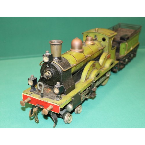 228 - A rare Bing gauge 3 spirit fired LSWR 4-4-0 tender locomotive. C.1902 Locomotive 39cm, 6 wheeled ten... 