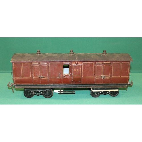 229 - A rare Bing Gauge 3 MR bogie Guards Van. 43cm, buffer to buffer, in lined maroon livery, with dark g... 