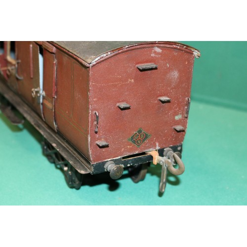 229 - A rare Bing Gauge 3 MR bogie Guards Van. 43cm, buffer to buffer, in lined maroon livery, with dark g... 