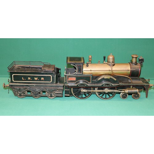 230 - A rare Bing gauge 3 spirit fired LNWR 4-4-0 tender locomotive. C.1902. Locomotive 36cm, 6 wheeled te... 