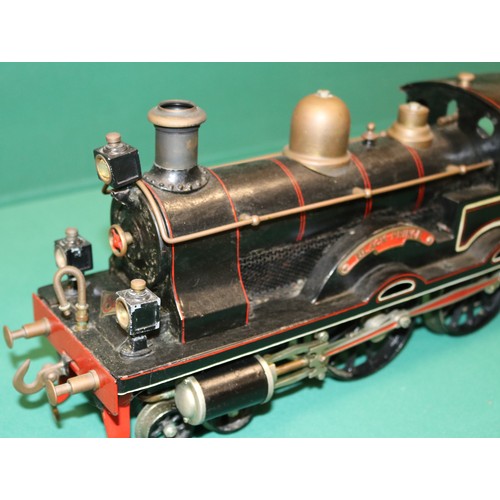 231 - A rare Bing gauge 3 spirit fired L&NWR 4-4-0 tender locomotive. C.1902. Locomotive 39cm, 6 wheeled t... 