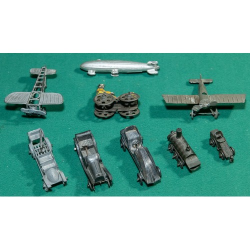 247 - 9 Antique Penny Toys. Including 2x Mono planes, 2 Veteran cars, A veteran car with mounted gun in th... 