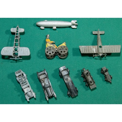 247 - 9 Antique Penny Toys. Including 2x Mono planes, 2 Veteran cars, A veteran car with mounted gun in th... 