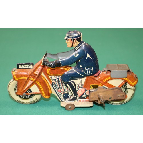 252 - Mettoy tinplate litho Police Patrol clockwork motorcycle dating from the 1950s. Litho is in very nic... 