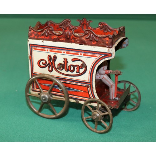 264 - Unknown maker, possibly German, early tinplate clockwork 4 wheels carriage. Has its driver sitting i... 