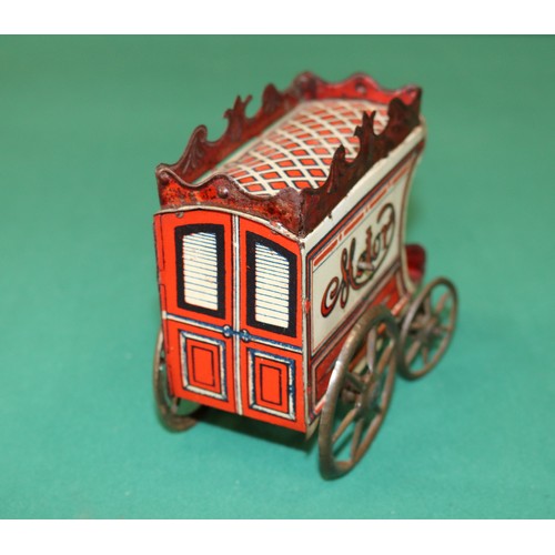 264 - Unknown maker, possibly German, early tinplate clockwork 4 wheels carriage. Has its driver sitting i... 