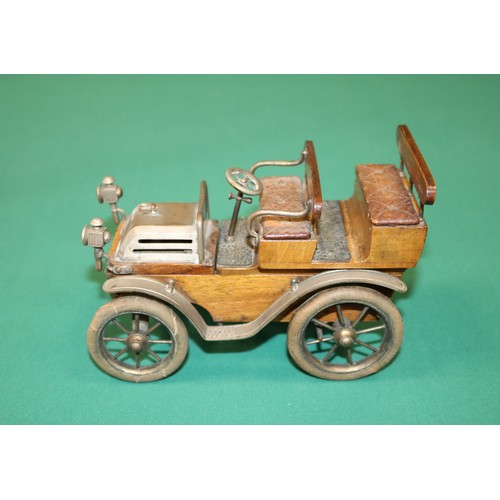 269 - A rare Earnst Plank German Desk Display car for holding Cigarettes and matches, possibly dating from... 