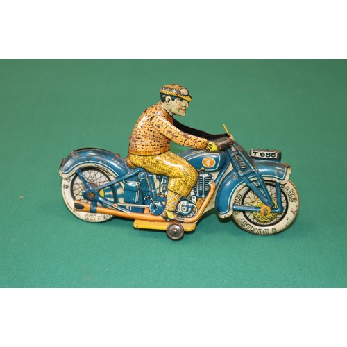 277 - Tipp & Co, T686 tinplate Motorcycle made in the 1930s  Tin-plate litho is in good condition. Clockwo... 