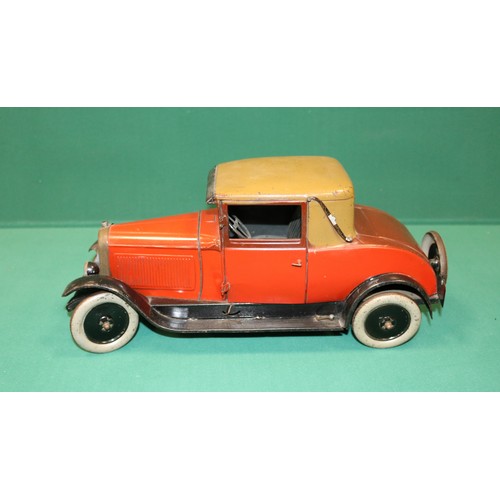 287 - A rare Andre Citroen 1930s, C6 Hard top Coupe tin-plate clock work Car, 40cm in length. These toys w... 