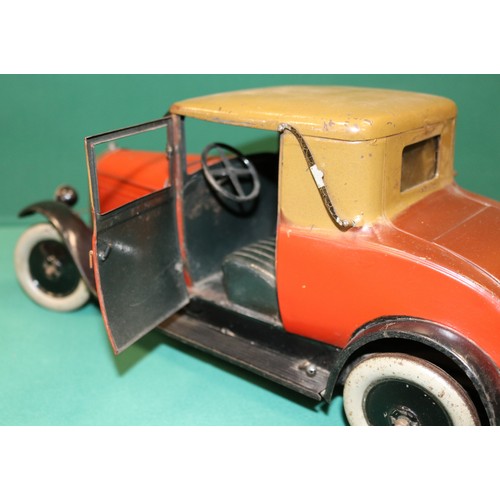 287 - A rare Andre Citroen 1930s, C6 Hard top Coupe tin-plate clock work Car, 40cm in length. These toys w... 