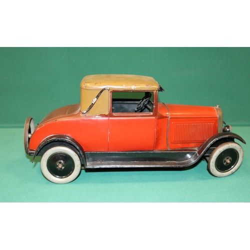 287 - A rare Andre Citroen 1930s, C6 Hard top Coupe tin-plate clock work Car, 40cm in length. These toys w... 