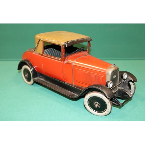 287 - A rare Andre Citroen 1930s, C6 Hard top Coupe tin-plate clock work Car, 40cm in length. These toys w... 