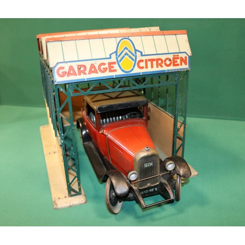 293 - A rare CIJ (ref325) tinplate Citroen garage. 41cm in length, 28cm maximum height. With a very origin... 