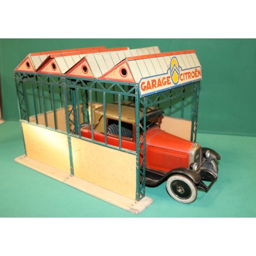 293 - A rare CIJ (ref325) tinplate Citroen garage. 41cm in length, 28cm maximum height. With a very origin... 