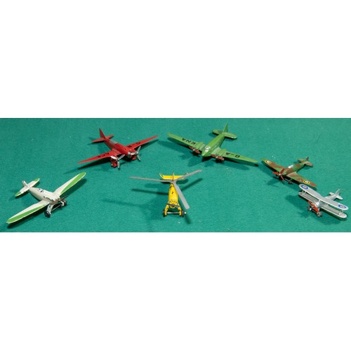 299 - 6 Dinky toys miniature Aeroplanes, Possibly dating from 1930s - 1940s. Includes Spitfire, Biplane, i... 