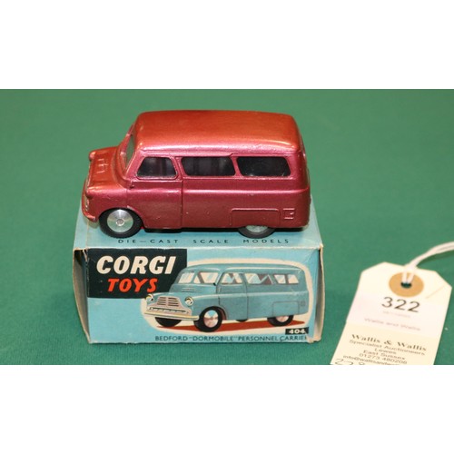 322 - Corgi Toys Bedford Dormobile Personnel Carrier (404). An example in metallic cerise with smooth spun... 