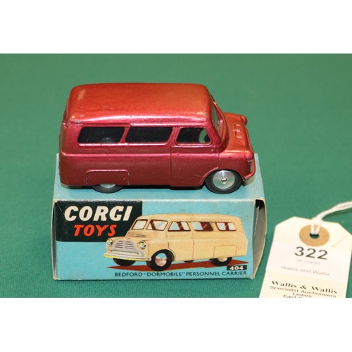 322 - Corgi Toys Bedford Dormobile Personnel Carrier (404). An example in metallic cerise with smooth spun... 