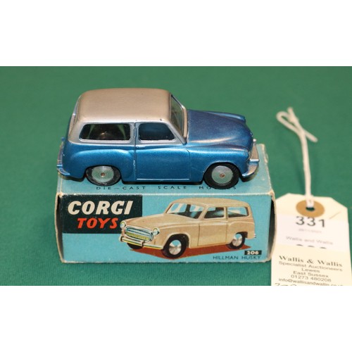 331 - Corgi Toys Hillman Husky (206). An early example in metallic silver and metallic blue, with smooth s... 