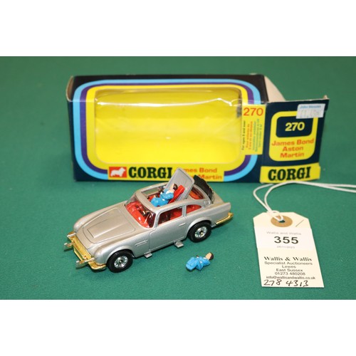 355 - Corgi Toys James Bond's Aston Martin (270). In metallic silver with red interior, example with the f... 