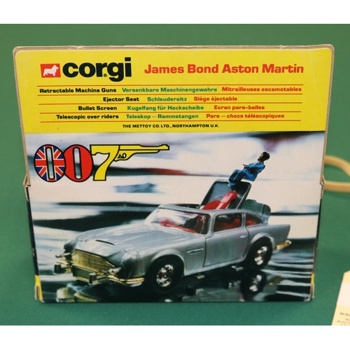 356 - Corgi Toys James Bond's Aston Martin (271). The first of the larger 1:36 scale issues. In metallic s... 