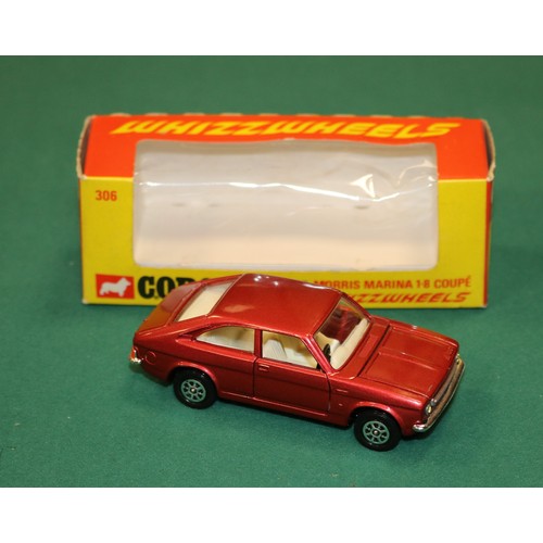 409 - Corgi Whizzwheels Morris Marina 1.8 Coupe (306). An example in metallic cerise with cream interior. ... 