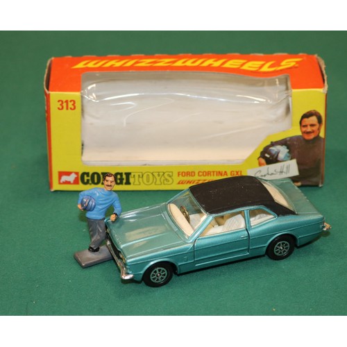 411 - Corgi Toys Whizzwheels Ford Cortina GXL 'Graham Hill' (313). An example in metallic light blue with ... 