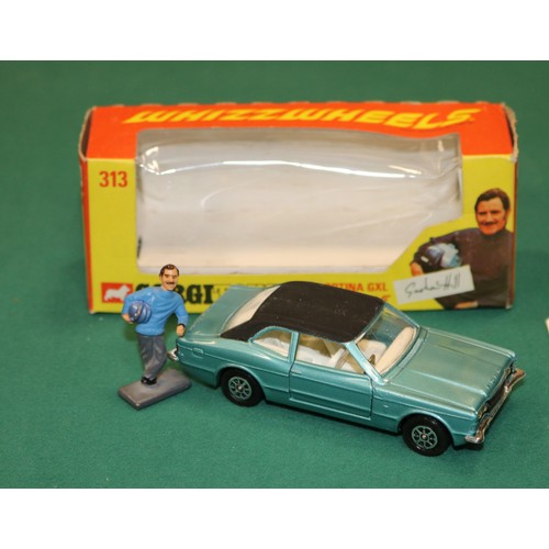 411 - Corgi Toys Whizzwheels Ford Cortina GXL 'Graham Hill' (313). An example in metallic light blue with ... 