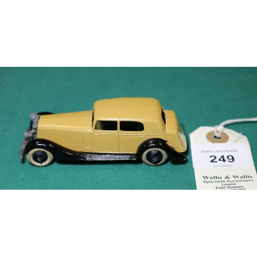 303 - Dinky Toys 30 Series Daimler (30C). A 1936-1940 example with tan body open black chassis, thin axles... 