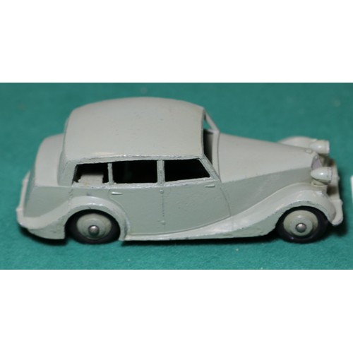 306 - Dinky Toys Triumph 1800 (40b). An example in light grey with darker grey wheels and black rubber tyr... 