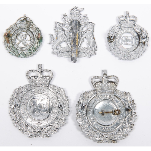 16 - Four obsolete Devon Constabulary badges: chrome plated ERII wreath pattern helmet badge; another sim... 