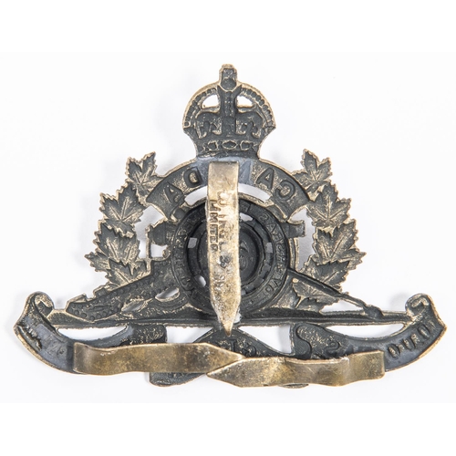 201 - WWI Canadian CEF 61st Overseas Battery Canadian Field Artillery cap badge, with three tangs, stamped... 