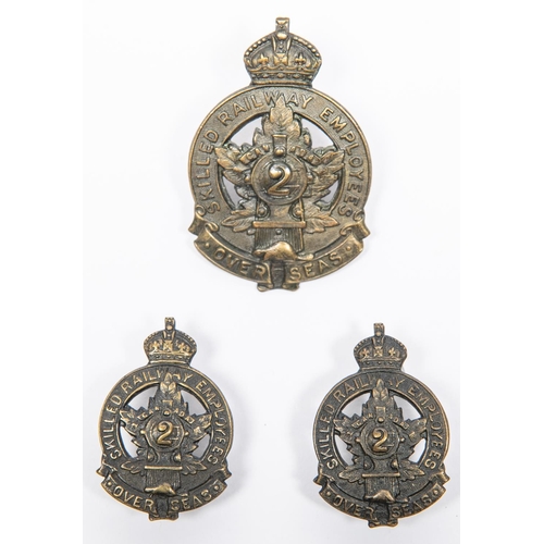 210 - WWI CEF 2nd Overseas Skilled Railway Employees cap badge, and a pair of matching collar badges, all ... 