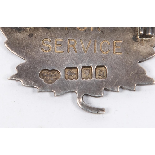 214 - 5 WWI Canadian Y.M.C.A. badges: bronze and enamel cap badges; a similar collar badge with pin fittin... 