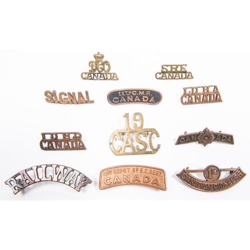 233 - 11 WWI Canadian metal shoulder titles: 