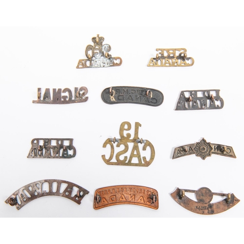 233 - 11 WWI Canadian metal shoulder titles: 