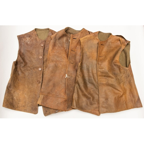 279 - 3 WWII leather jerkins, dated 1942 and 1943, all are well worn with some repairs. £90-100