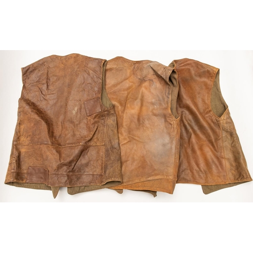 279 - 3 WWII leather jerkins, dated 1942 and 1943, all are well worn with some repairs. £90-100