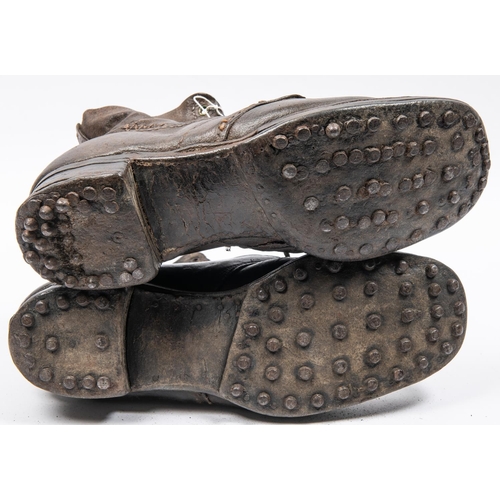 301 - A very scarce pair of WWI infantry ORs marching boots, heavily studded, they have been dubbined in s... 