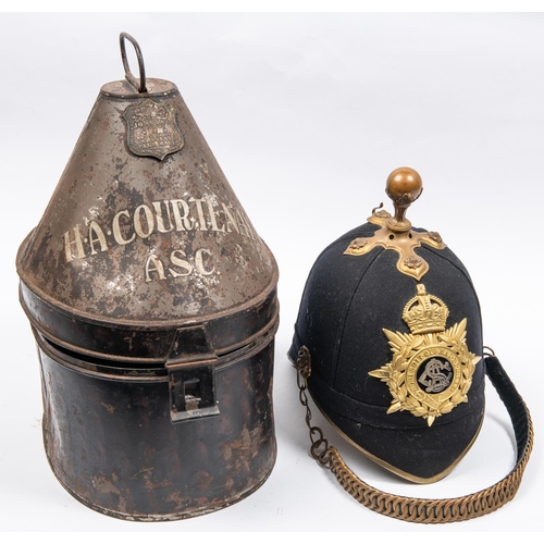 302 - An officer's blue cloth helmet of the Army Service Corps, with brass mounts including ball top, and ... 