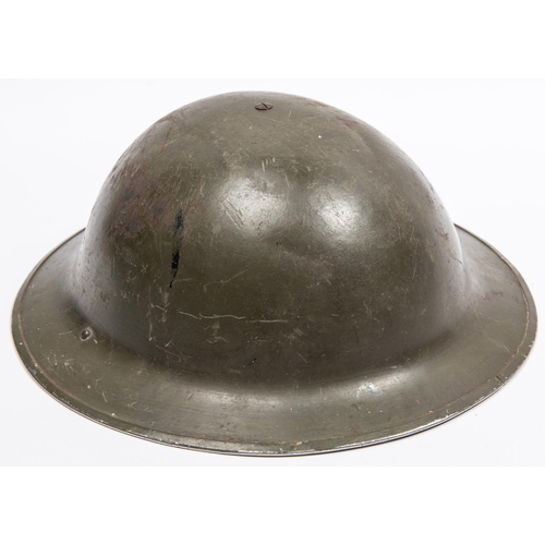 307 - A British WWII Mk 2 steel helmet, dated 1941, with painted regimental insignia. GC, purchased from a... 