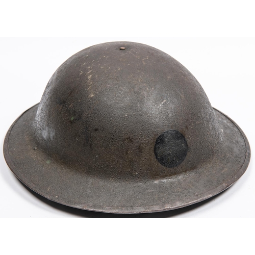 314 - A WWI American Brodie's Pattern steel helmet, with turned over rim, the underside of the brim stampe... 