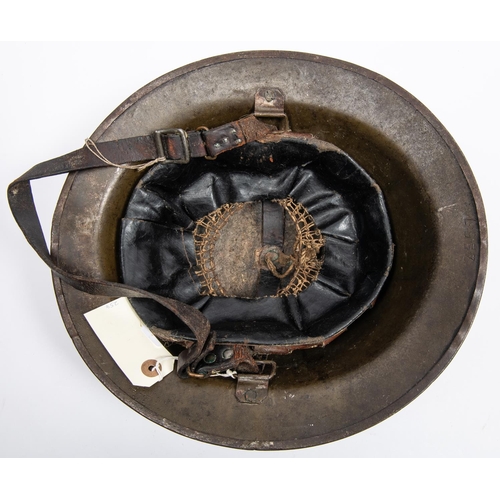 314 - A WWI American Brodie's Pattern steel helmet, with turned over rim, the underside of the brim stampe... 