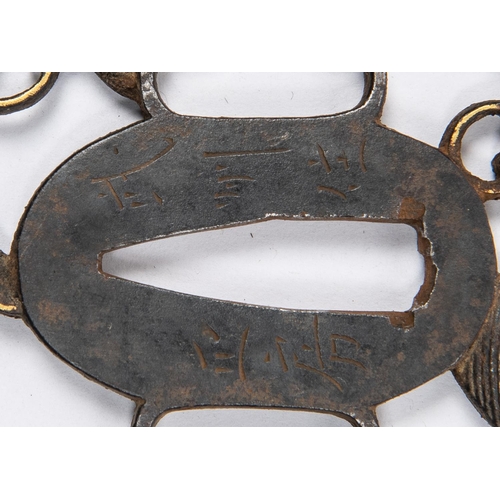 355 - A pierced iron tsuba, signed, and with gold decoration. GC, some wear to the gold. £50-100