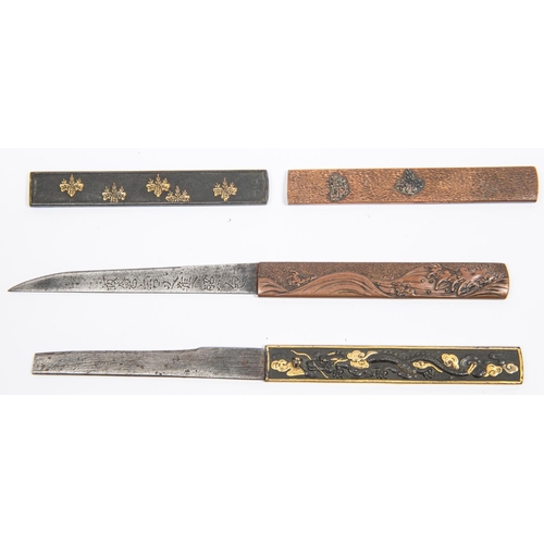 358 - A kozuka, of shakudo finely embossed and gold overlaid with a dragon and clouds, with gold back and ... 