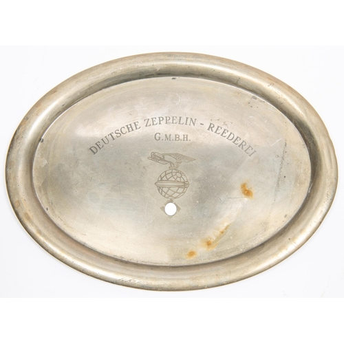 65 - An oval nickel silver mess tray, engraved 