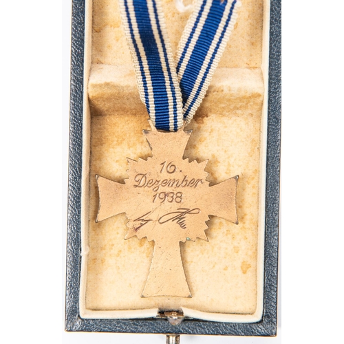 96 - A Third Reich Luftschutz Decoration 2nd class, with ribbon, and pin, in its box with printed lid; Mo... 