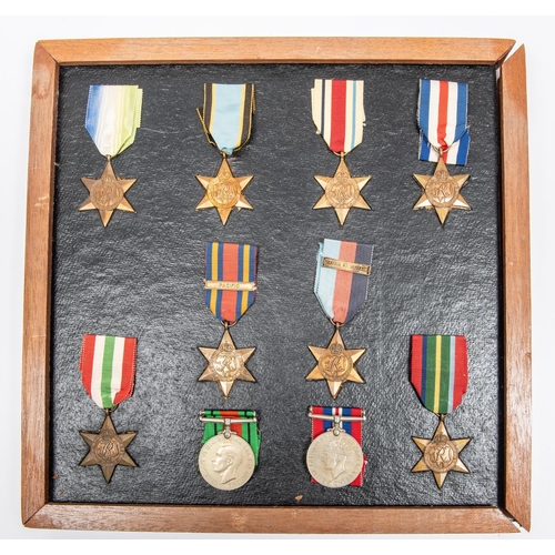 53 - WWII medals: a display of 8 different WWII stars in frame, including Air Crew Europe, the 1939-45 st... 